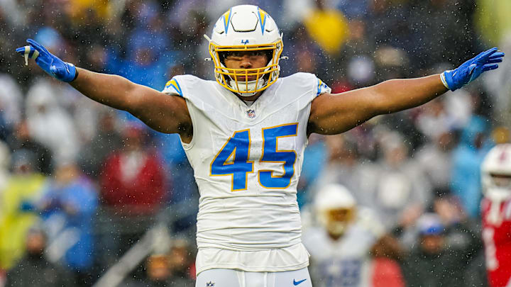 Dec 3, 2023; Foxborough, Massachusetts, USA; Los Angeles Chargers linebacker Tuli Tuipulotu (45) reacts after stopping the first down against the New England Patriots in the second quarter at Gillette Stadium.