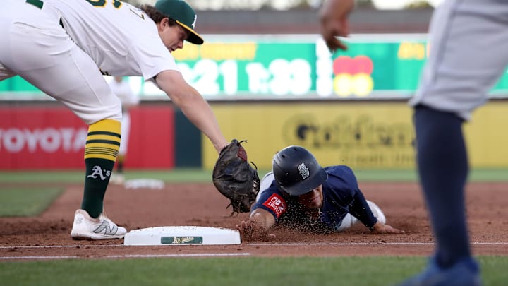 Seattle Mariners second fielder Leo Rivas is tagged out at first base during a game against the Athletics on May 5 at Sutter Health Park.