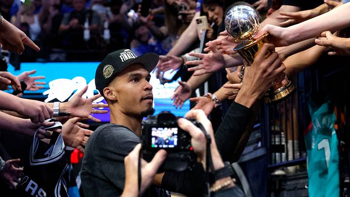 May 30, 2026; Oklahoma City, Oklahoma, USA; San Antonio Spurs forward Victor Wembanyama (1) celebrates with the MVP trophy after defeating the Oklahoma City Thunder in game seven of the western conference finals for the 2026 NBA playoffs at Paycom Center. Mandatory Credit: Alonzo Adams-Imagn Images
