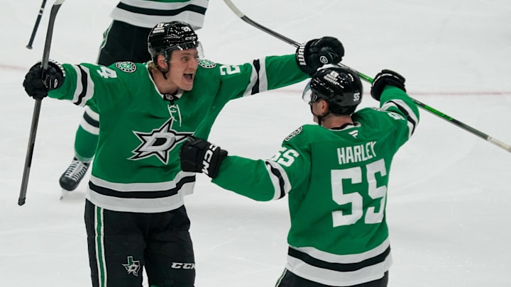 Apr 19, 2025; Dallas, Texas, USA; Dallas Stars center Roope Hintz (24) celebrates his goal with defenseman Thomas Harley (55) during the third period in game one of the first round of the 2025 Stanley Cup Playoffs against the Colorado Avalanche at American Airlines Center. Mandatory Credit: Raymond Carlin III-Imagn Images