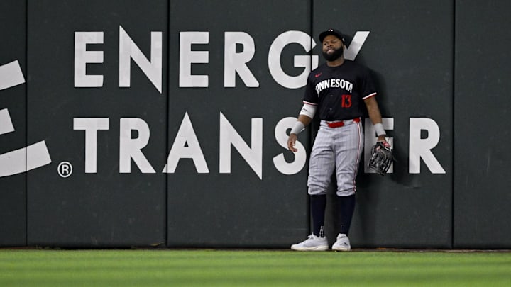 Aug 18, 2024; Arlington, Texas, USA; Minnesota Twins center fielder Manuel Margot (13) looks on after Texas Rangers designated hitter Josh Jung (not pictured) hits the go ahead home run against the Minnesota Twins during the seventh inning at Globe Life Field. Mandatory Credit: Jerome Miron-Imagn Images
