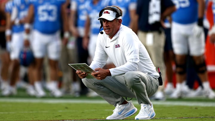 Sep 13, 2025; Oxford, Mississippi, USA; Mississippi Rebels head coach Lane Kiffin looks on during the second quarter against the Arkansas Razorback at Vaught-Hemingway Stadium. Mandatory Credit: Petre Thomas-Imagn Images Sep 13, 2025; Oxford, Mississippi, USA; Mississippi Rebels head coach Lane Kiffin looks on during the second quarter against the Arkansas Razorback at Vaught-Hemingway Stadium. Mandatory Credit: Petre Thomas-Imagn Images