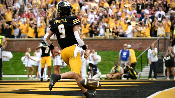 Oct 11, 2025; Columbia, MO; USA; Missouri Tigers quarterback Beau Pribula (9) celebrates after a touchdown in the third quarter against the Alabama Crimson Tide at Faurot Field at Memorial Stadium.