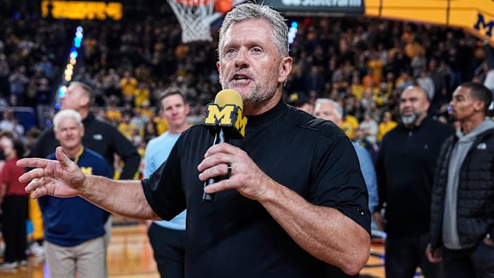 Michigan football head coach Kyle Whittingham speaks as he is being introduced on the floor during the first half between Michigan and USC at Crisler Center in Ann Arbor on Friday, Jan. 2, 2026.