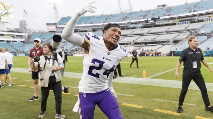 Nov 10, 2024; Jacksonville, Florida, USA; Minnesota Vikings safety Camryn Bynum (24) celebrates the win over the Jacksonville Jaguars at EverBank Stadium. Mandatory Credit: Morgan Tencza-Imagn Images