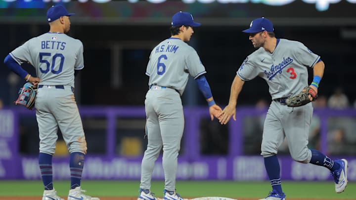 May 5, 2025; Miami, Florida, USA; Los Angeles Dodgers left fielder Chris Taylor (3) celebrates with second baseman Hyeseong Kim (6) after the game against the Miami Marlins at loanDepot Park. Mandatory Credit: Sam Navarro-Imagn Images