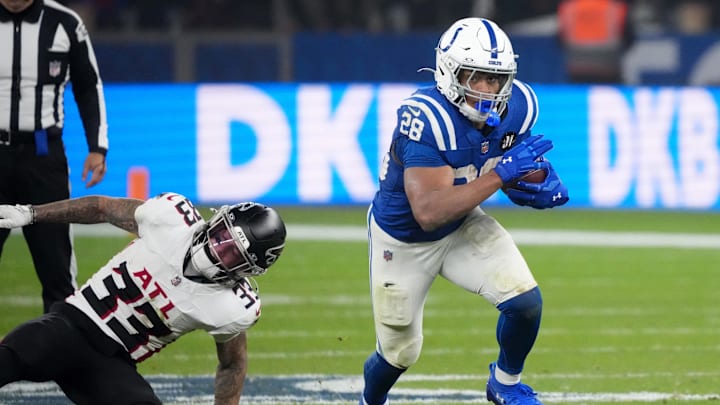 Nov 9, 2025; Berlin, Germany; Indianapolis Colts running back Jonathan Taylor (28) runs the ball against the Atlanta Falcons during the NFL Berlin Game at Olympic Stadium. 