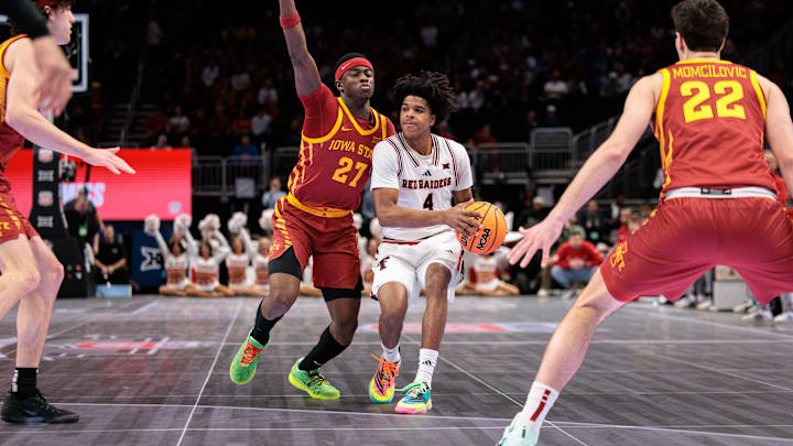 Mar 12, 2026; Kansas City, MO, USA; Texas Tech Red Raiders guard Christian Anderson (4) brings the ball up court around Iowa State Cyclones guard Killyan Toure (27) during the first half at T-Mobile Center. Mandatory Credit: William Purnell-Imagn Images