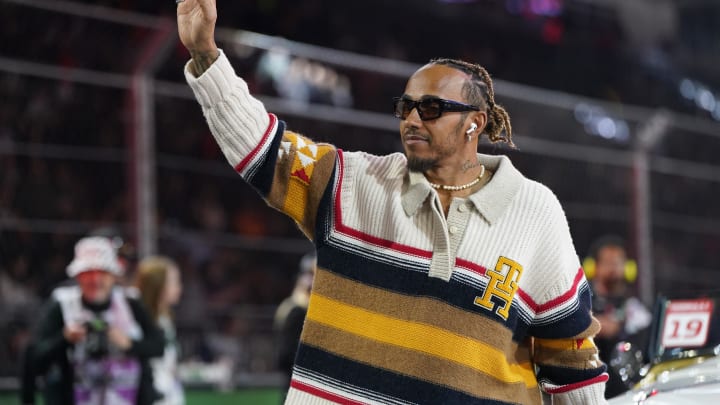 Nov 18, 2023; Las Vegas, Nevada, USA;  Mercedes AMG Petronas Motorsport driver Lewis Hamilton of Great Britain (44) waves to fans during the Formula 1 Heineken Silver Las Vegas Grand Prix begins at the Las Vegas Strip Circuit. Mandatory Credit: Lucas Peltier-USA TODAY Sports
