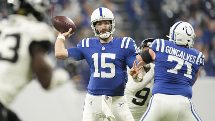 Jan 5, 2025; Indianapolis, Indiana, USA; Indianapolis Colts quarterback Joe Flacco (15) looks for an open receiver downfield during a game against the Jacksonville Jaguars at Lucas Oil Stadium. Mandatory Credit: Grace Hollars/USA TODAY Network via Imagn Images
