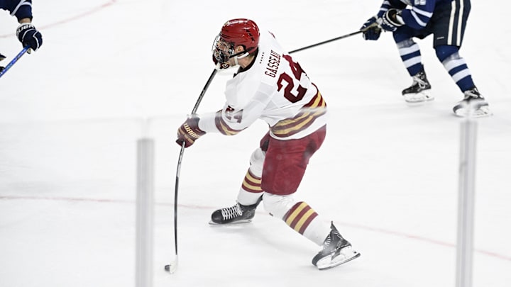 Feb 28, 2025; Chestnut Hill, MA, USA; Boston College forward Andre Gasseau (24) shoots against the University of New Hampshire during the second period at Conte Forum. Mandatory Credit: Eric Canha-Imagn Images