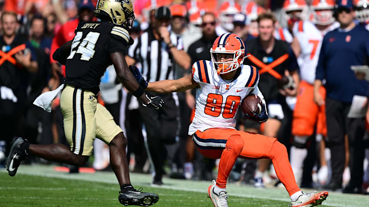 Oct 4, 2025; West Lafayette, Indiana, USA; Illinois Fighting Illini wide receiver Hank Beatty (80) runs into Purdue Boilermakers defensive back An'Darius Coffey (24) during the second quarter at Ross-Ade Stadium. Mandatory Credit: Marc Lebryk-Imagn Images