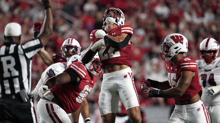 Aug 28, 2025; Madison, Wisconsin, USA;  Wisconsin Badgers linebacker Mason Reiger (22) celebrates following a sack during the second quarter against the Miami (OH) RedHawks at Camp Randall Stadium.