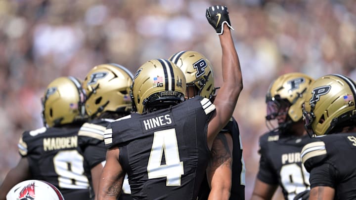 Purdue Boilermakers defensive back Hudauri Hines (4) raises a hand 