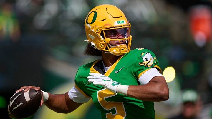 Sep 5, 2026; Eugene, Oregon, USA; Oregon Ducks quarterback Dante Moore (5) warms up before a game against the Boise State Broncos at Autzen Stadium. Mandatory Credit: Troy Wayrynen-Imagn Images