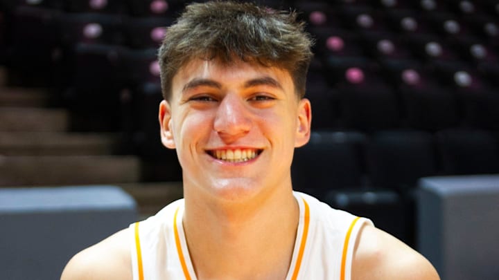 Tennessee forward JP Estrella (13) smiles at the Food City Center for Tennessee Basketball media day on Tuesday Oct. 3, 2023. Tennessee forward JP Estrella (13) smiles at the Food City Center for Tennessee Basketball media day on Tuesday Oct. 3, 2023.