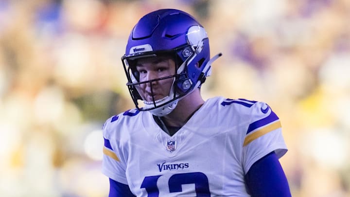 Jan 13, 2025; Glendale, AZ, USA; Minnesota Vikings quarterback Nick Mullens (12) against the Los Angeles Rams during an NFC wild card game at State Farm Stadium. Mandatory Credit: Mark J. Rebilas-Imagn Images