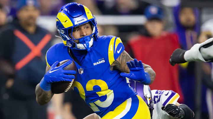 Jan 13, 2025; Glendale, AZ, USA; Los Angeles Rams running back Kyren Williams (23) against the Minnesota Vikings during an NFC wild card game at State Farm Stadium. Mandatory Credit: Mark J. Rebilas-Imagn Images Jan 13, 2025; Glendale, AZ, USA; Los Angeles Rams running back Kyren Williams (23) against the Minnesota Vikings during an NFC wild card game at State Farm Stadium. Mandatory Credit: Mark J. Rebilas-Imagn Images
