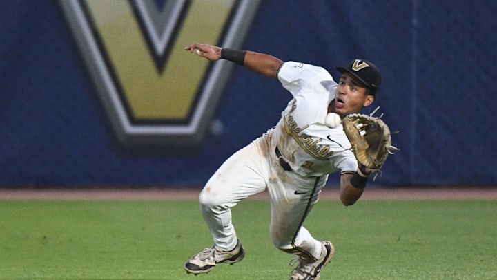 May 25 2024; Hoover, AL, USA; Vanderbilt outfielder Matthew Polk (1) makes a dramatic catch on a sinking line drive to right by a Tennessee batter at the Hoover Met during the SEC Tournament. Tennessee advanced to the championship game with a 6-4 victory.