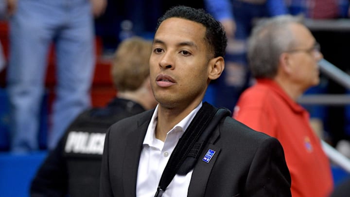 Jan 25, 2020; Lawrence, Kansas, USA; Kansas Jayhawks assistant coach/video co-ordinator Jeremy Case walks onto the court before the game against the Tennessee Volunteers at Allen Fieldhouse. Mandatory Credit: Denny Medley-Imagn Images