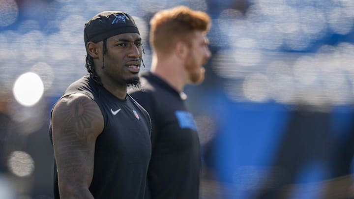 Nov 24, 2024; Charlotte, North Carolina, USA; Carolina Panthers wide receiver Xavier Legette (17) and quarterback Andy Dalton (14) during pregame warmups against the Kansas City Chiefs at Bank of America Stadium. Mandatory Credit: Jim Dedmon-Imagn Images