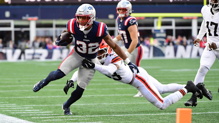 Oct 26, 2025; Foxborough, Massachusetts, USA;  Cleveland Browns linebacker Mohamoud Diabate (43) tackesl New England Patriots running back Treveyon Henderson (32) during the fourth quarter at Gillette Stadium. Mandatory Credit: Bob DeChiara-Imagn Images
