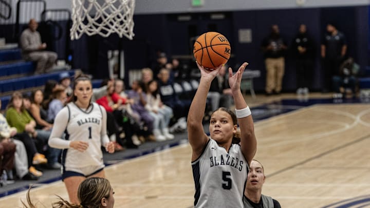 Sierra Canyon's Jerzy Robinson shoots against Bishop O'Dowd.