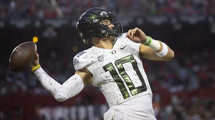Oct 8, 2022; Tucson, Arizona, USA; Oregon Ducks quarterback Bo Nix (10) against the Arizona Wildcats at Arizona Stadium. Mandatory Credit: Mark J. Rebilas-Imagn Images