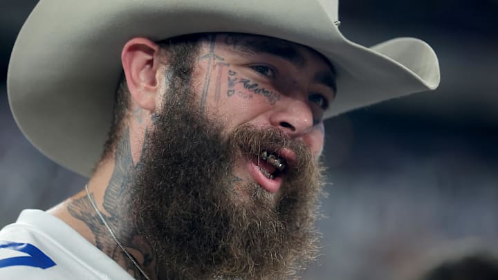 American recording artist Post Malone on the field before a game between the New York Giants and the Dallas Cowboys.