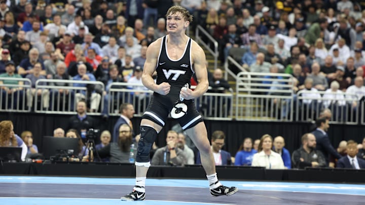 Mar 23, 2024; Kansas City, MO, USA; At 149 pounds Virginia Tech Hokies wrestler Caleb Henson celebrates after defeating Michigan Wolverines wrestler Austin Gomez.   Mandatory Credit: Reese Strickland-Imagn Images