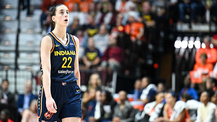 Sep 22, 2024; Uncasville, Connecticut, USA; Indiana Fever guard Caitlin Clark (22) looks at the video board in the fourth quarter against Connecticut Sun during game one of the first round of the 2024 WNBA Playoffs at Mohegan Sun Arena. Mandatory Credit: Mark Smith-Imagn Images