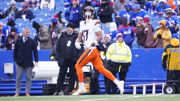 Jan 12, 2025; Orchard Park, New York, USA; Denver Broncos wide receiver Devaughn Vele (17) warms up before a game against the Buffalo Bills in an AFC wild card game at Highmark Stadium. Mandatory Credit: Gregory Fisher-Imagn Images