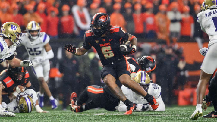 Nov 18, 2023; Corvallis, Oregon, USA; Oregon State Beavers running back Damien Martinez (6) runs the ball during the second half against the Washington Huskies at Reser Stadium. Mandatory Credit: Craig Strobeck-USA TODAY Sports