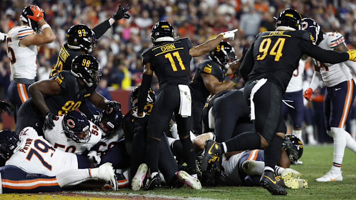 Cole Kmet's reaction (far left) is what many Bears fans thought as Doug Kramer fumbled at the goal line on a William Perry style run against the Commanders.