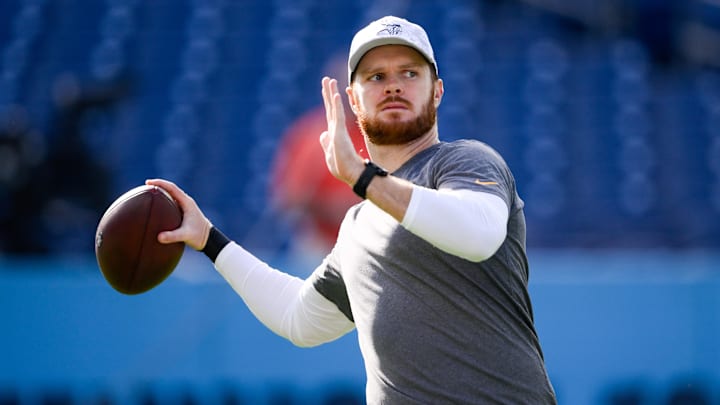 Minnesota Vikings quarterback Sam Darnold  warms up before a game against the Tennessee Titans at Nissan Stadium.