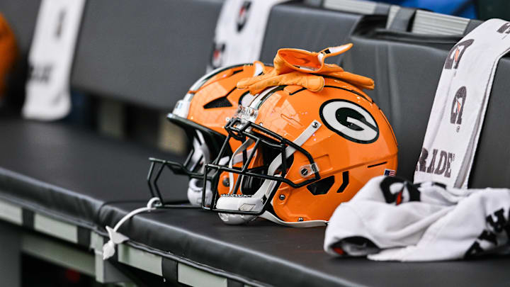 Dec 29, 2024; Minneapolis, Minnesota, USA; A Green Bay Packers helmet sits ready before the game against the Minnesota Vikings at U.S. Bank Stadium. Mandatory Credit: Jeffrey Becker-Imagn Images Dec 29, 2024; Minneapolis, Minnesota, USA; A Green Bay Packers helmet sits ready before the game against the Minnesota Vikings at U.S. Bank Stadium. Mandatory Credit: Jeffrey Becker-Imagn Images
