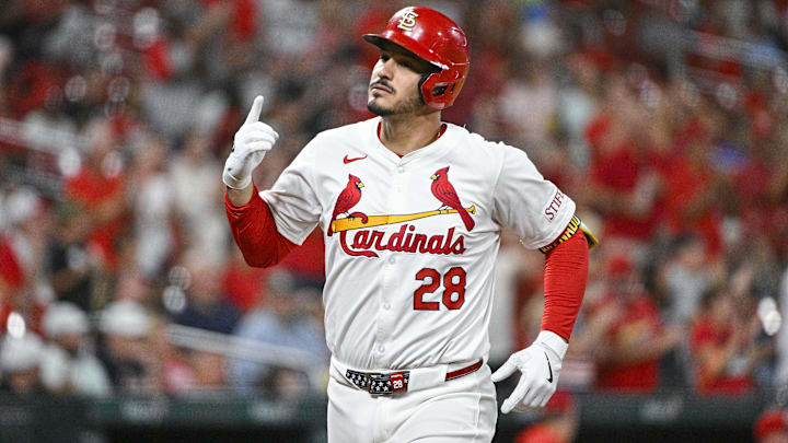 Sep 11, 2024; St. Louis, Missouri, USA;  St. Louis Cardinals third baseman Nolan Arenado (28) reacts after hitting a solo home run against the Cincinnati Reds during the fourth inning at Busch Stadium