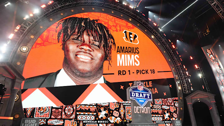 Apr 25, 2024; Detroit, MI, USA;  Georgia Bulldogs tackle Amarius Mims is selected as the No. 18 pick of the first round by the Cincinnati Bengals during the 2024 NFL Draft at Campus Martius Park and Hart Plaza. Mandatory Credit: Kirby Lee-Imagn Images