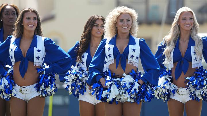 Dallas Cowboys cheerleaders perform at training camp opening ceremonies at River Ridge Playing Fields. Dallas Cowboys cheerleaders perform at training camp opening ceremonies at River Ridge Playing Fields.