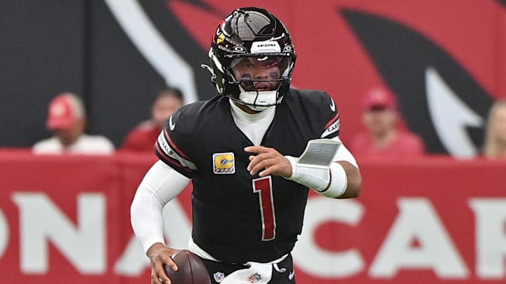 Oct 5, 2025; Glendale, Arizona, USA; Arizona Cardinals quarterback Kyler Murray (1) looks to throw against the Tennessee Titans during the second quarter at State Farm Stadium. Mandatory Credit: Matt Kartozian-Imagn Images