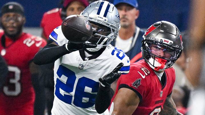 Dallas Cowboys cornerback Daron Bland (26) attempts but cannot intercept a pass intended for Tampa Bay Buccaneers wide receiver Emeka Egbuka (2) during the game between the Cowboys and the Buccaneers at AT&T Stadium. Mandatory Credit: Jerome Miron-Imagn Images Dallas Cowboys cornerback Daron Bland (26) attempts but cannot intercept a pass intended for Tampa Bay Buccaneers wide receiver Emeka Egbuka (2) during the game between the Cowboys and the Buccaneers at AT&T Stadium. Mandatory Credit: Jerome Miron-Imagn Images