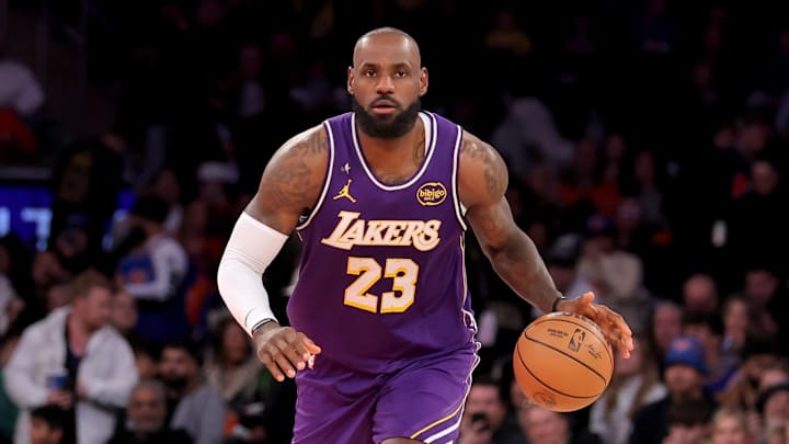 Feb 1, 2026; New York, New York, USA; Los Angeles Lakers forward LeBron James (23) brings the ball up court against the New York Knicks during the third quarter at Madison Square Garden. 