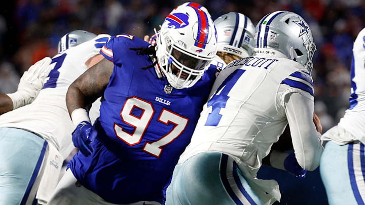 Buffalo Bills defensive tackle Jordan Phillips (97) gets the sack on Dallas Cowboys quarterback Dak Prescott (4). Prescott was sacked 3 times.
