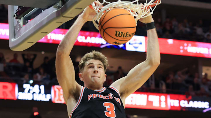 Dec 21, 2024; Newark, New Jersey, USA; Princeton Tigers forward Caden Pierce (3) dunks the ball against the Rutgers Scarlet Knights during the second half at Prudential Center.