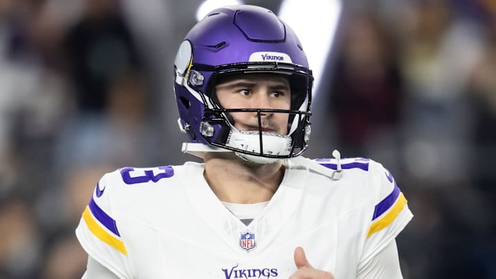 Jan 13, 2025; Glendale, AZ, USA; Minnesota Vikings quarterback Daniel Jones (13) against the Los Angeles Rams during an NFC wild card game at State Farm Stadium. Mandatory Credit: Mark J. Rebilas-Imagn Images
