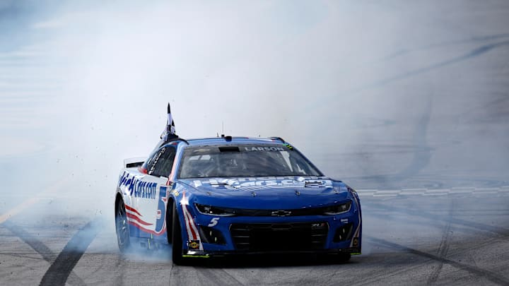 BRISTOL, TENNESSEE - APRIL 13: Kyle Larson, driver of the #5 HendrickCars.com Chevrolet, celebrates with a burnout after winning the NASCAR Cup Series Food City 500 at Bristol Motor Speedway on April 13, 2025 in Bristol, Tennessee.
