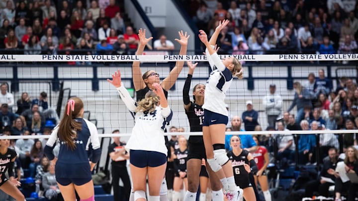 Penn State's Izzy Starck, right, jumps up to set the ball during a Big Ten volleyball match against Nebraska at Rec Hall Penn State's Izzy Starck, right, jumps up to set the ball during a Big Ten volleyball match against Nebraska at Rec Hall