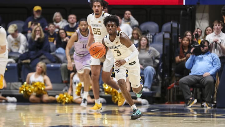 Jan 27, 2026; Morgantown, West Virginia, USA; West Virginia Mountaineers guard Honor Huff (3) dribbles up the floor during the second half against the Kansas State Wildcats at Hope Coliseum. Mandatory Credit: Ben Queen-Imagn Imagesa