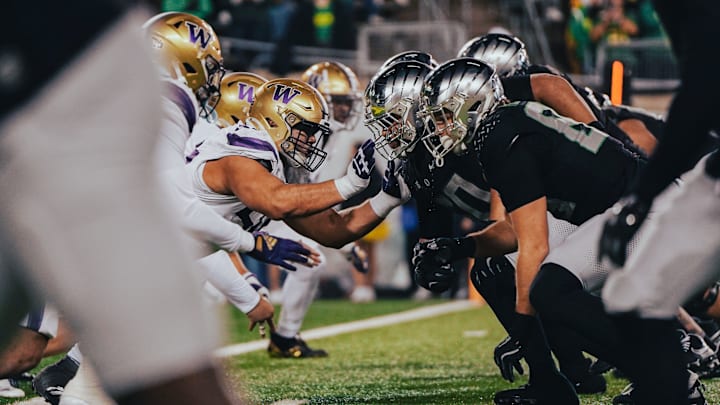 Sebastian Valdez, arms outstretched, will try and impress the NFL scouts at Husky Pro Day. 