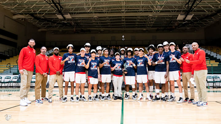 Redondo Union boys basketball poses after winning the Tournament of Champions in Phoenix, Ariz.